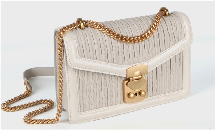 white luxury cross body purse
